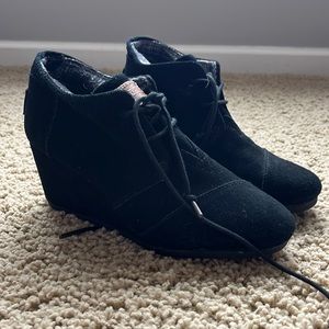 TOMS black suede lace up wedge bootie